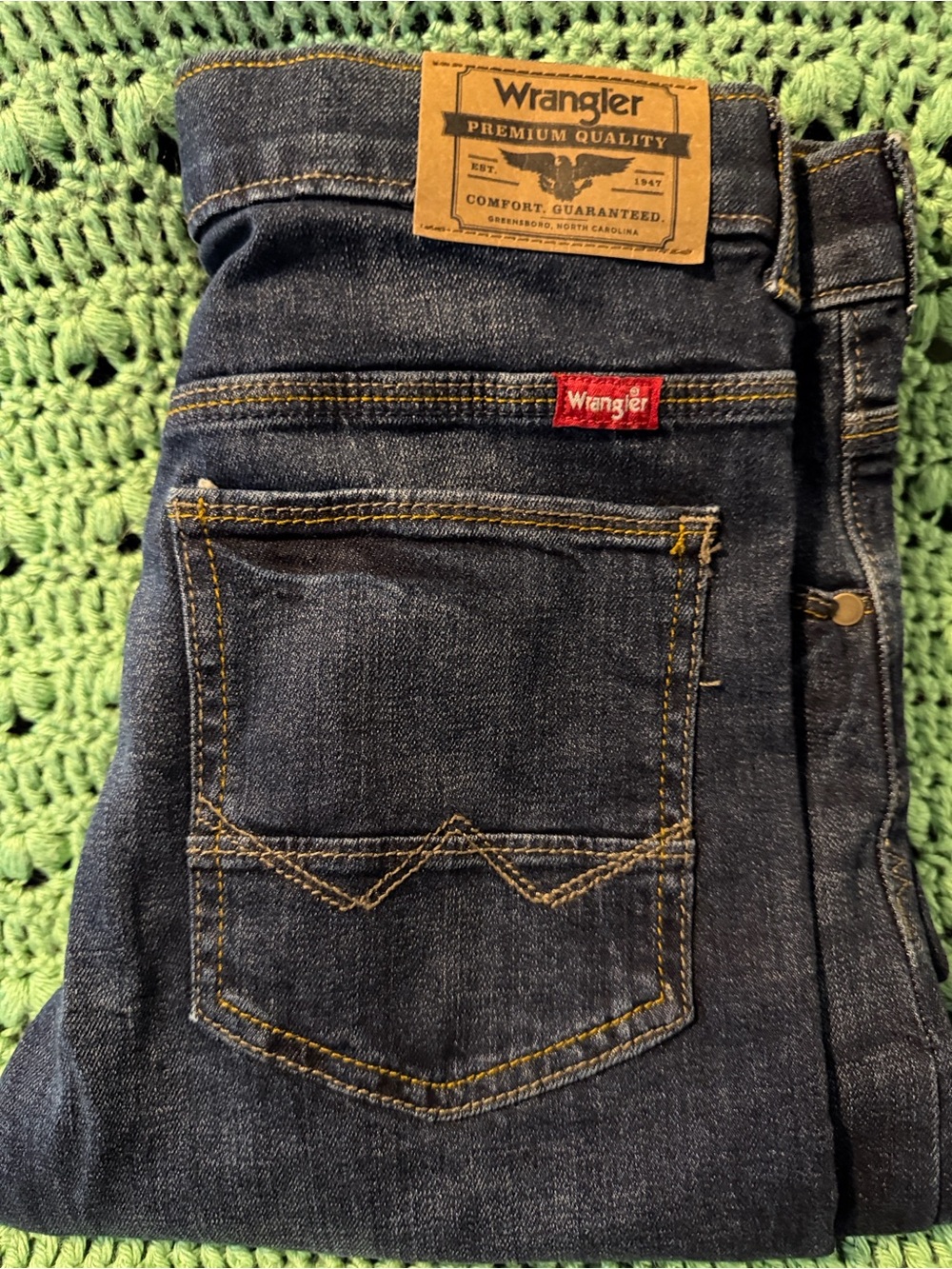 Wrangler Slim Fit Jeans in Dark Indigo with Yellow Stitching